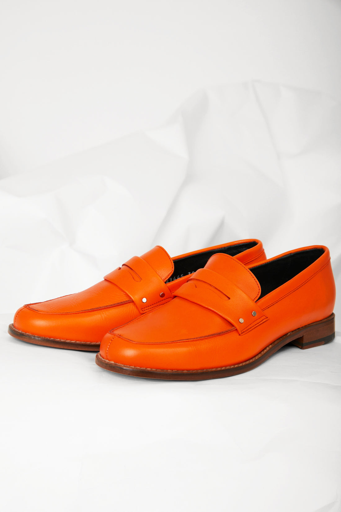 Mocassins Fender en cuir orange, Valentine Gauthier